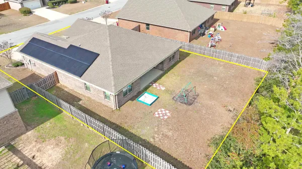 a kitchen with stainless steel appliances granite countertop a sink stove microwave and refrigerator