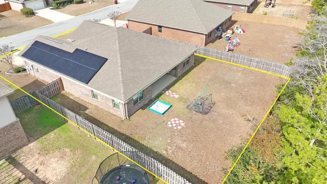 a kitchen with stainless steel appliances granite countertop a sink stove microwave and refrigerator