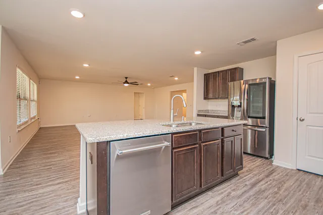 a view of a room with racks on the wall