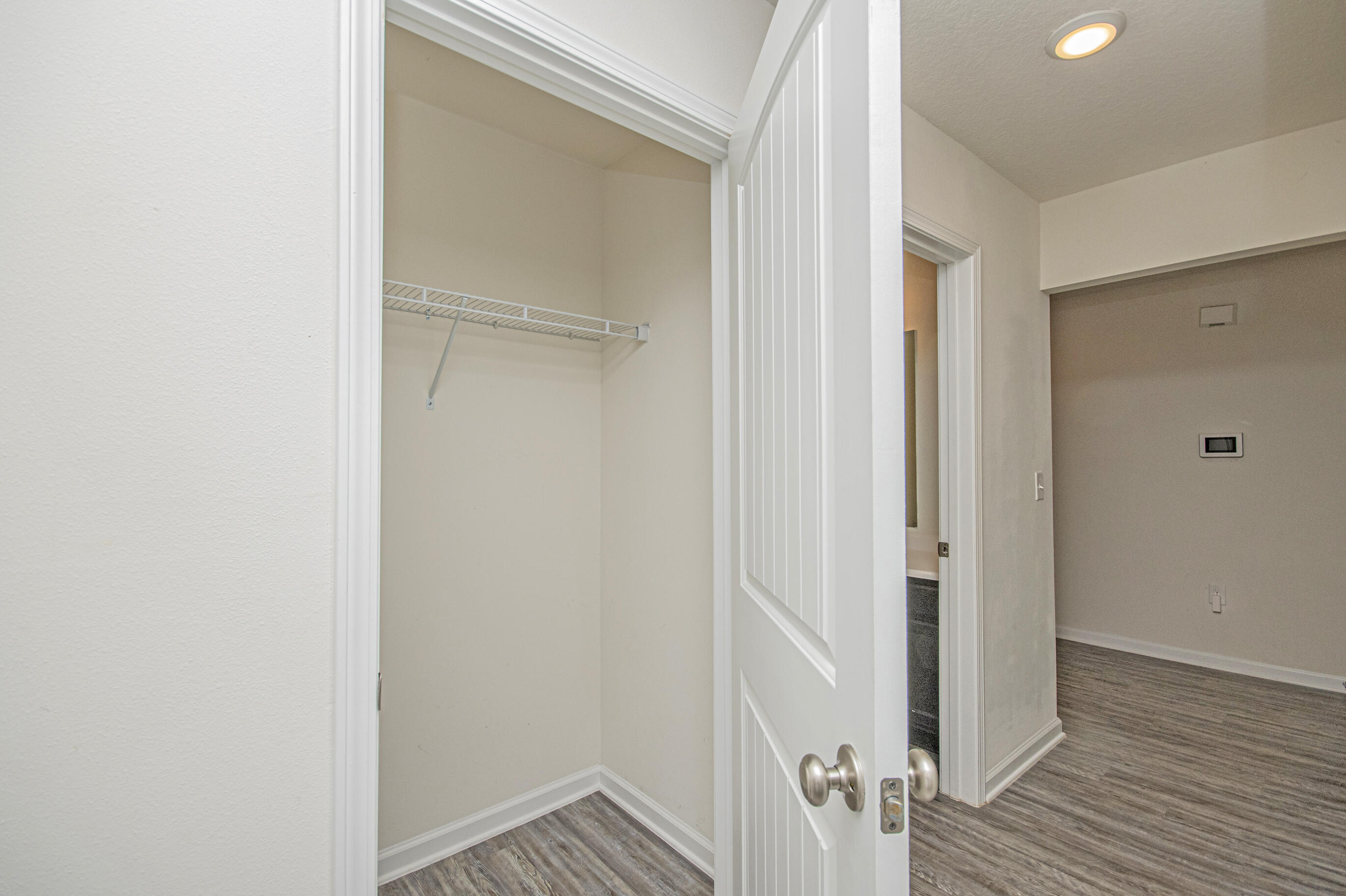 356 Merlin Court Crestview, FL 32539 - Photo 36 of 70 a view of a room with wooden floor