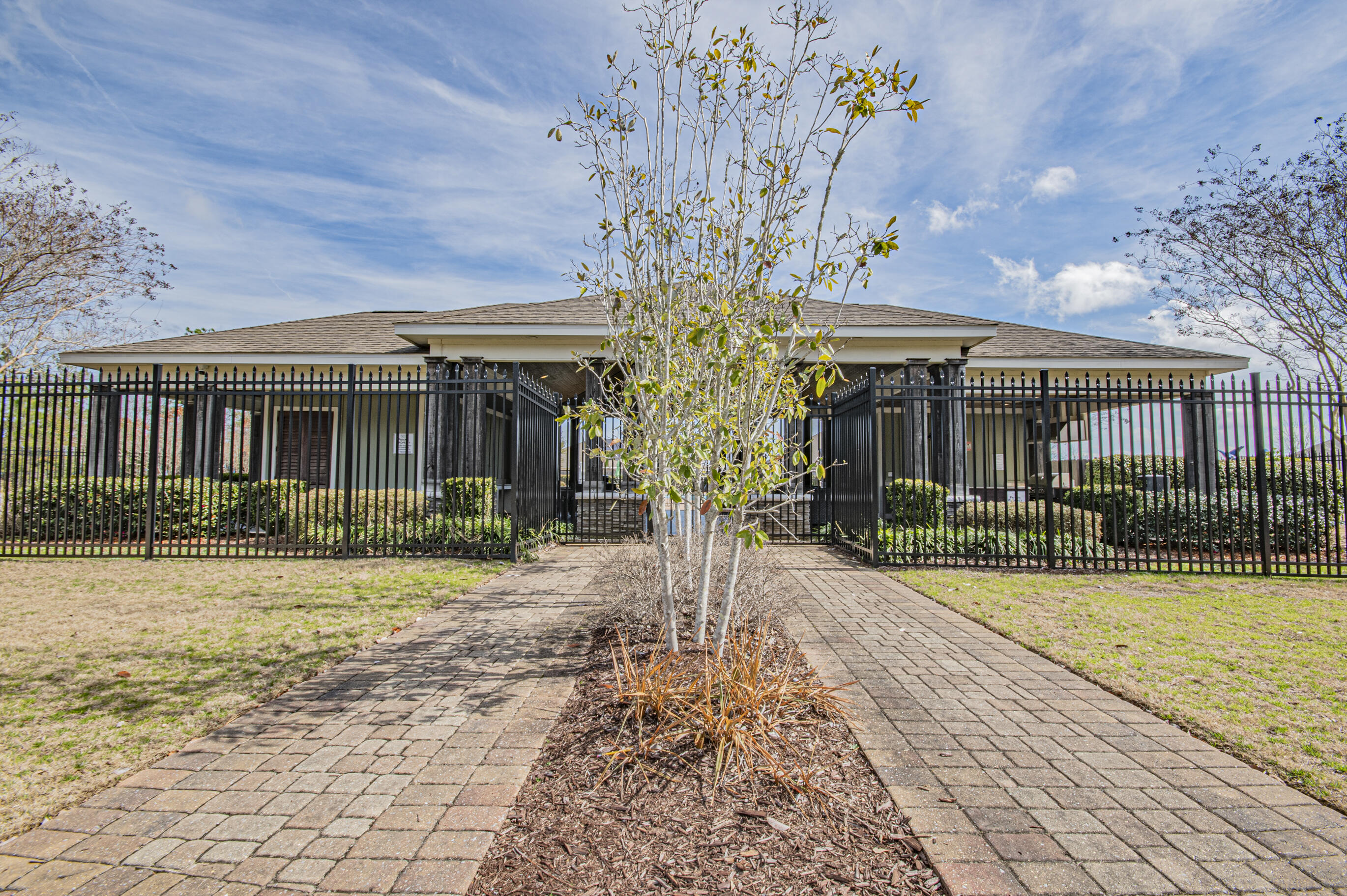 356 Merlin Court Crestview, FL 32539 - Photo 68 of 70 a front view of a house with garden