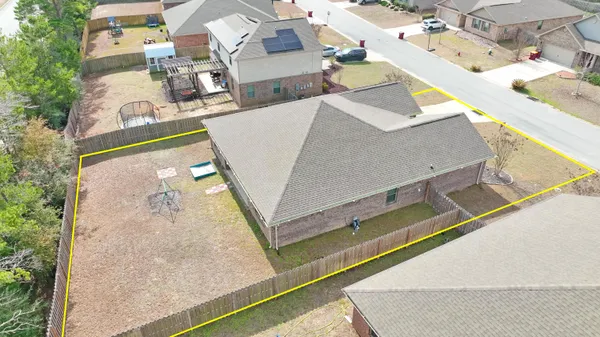 a view of hallway with wooden floor