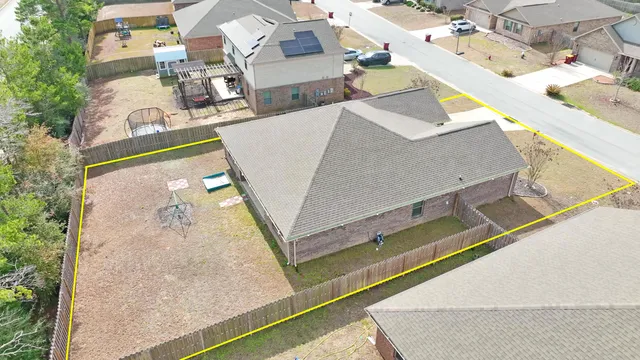 a view of hallway with wooden floor