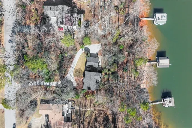 a aerial view of a house with a yard