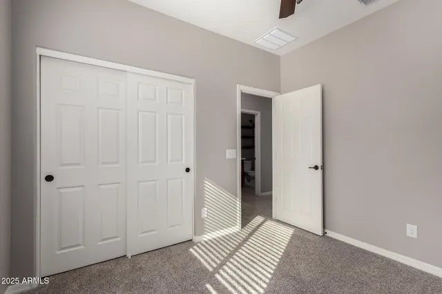 a view of a livingroom with a hallway