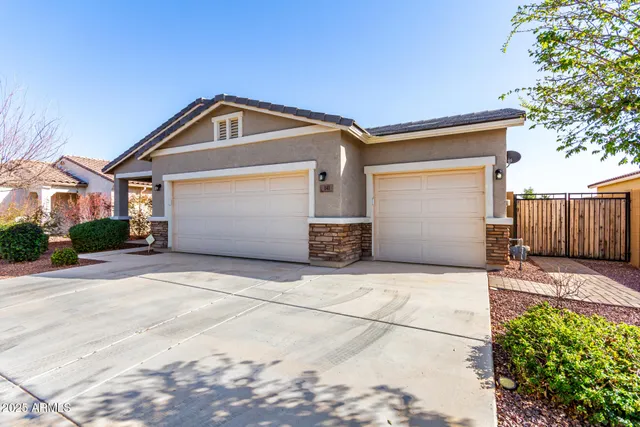 a front view of a house with a garage