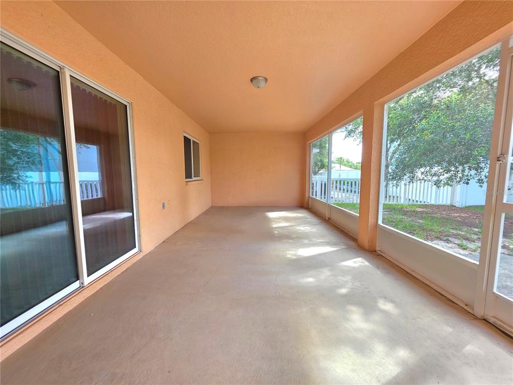 4284 High Ridge Avenue Spring Hill, FL 34609 - Photo 35 of 40 a view of a big room with windows and view of the house