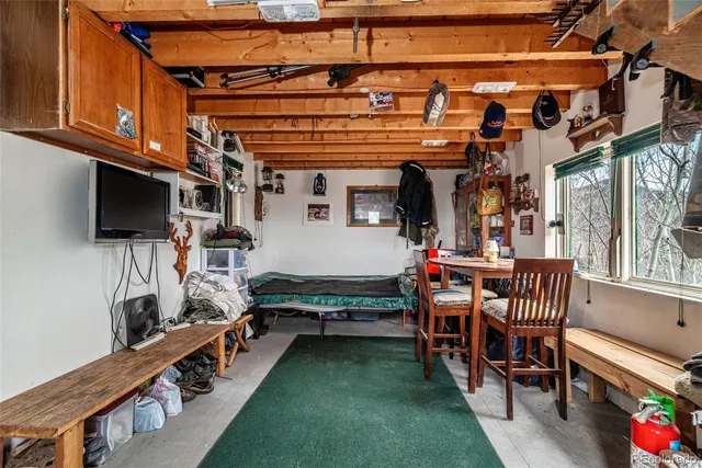 a view of a chairs and table in the patio