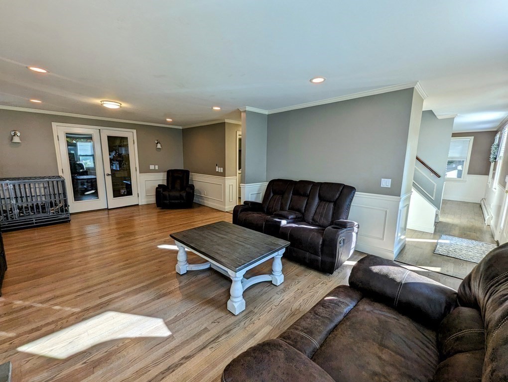 93 Blood Road Charlton, MA 01507 - Photo 24 of 42 a living room with furniture and wooden floor
