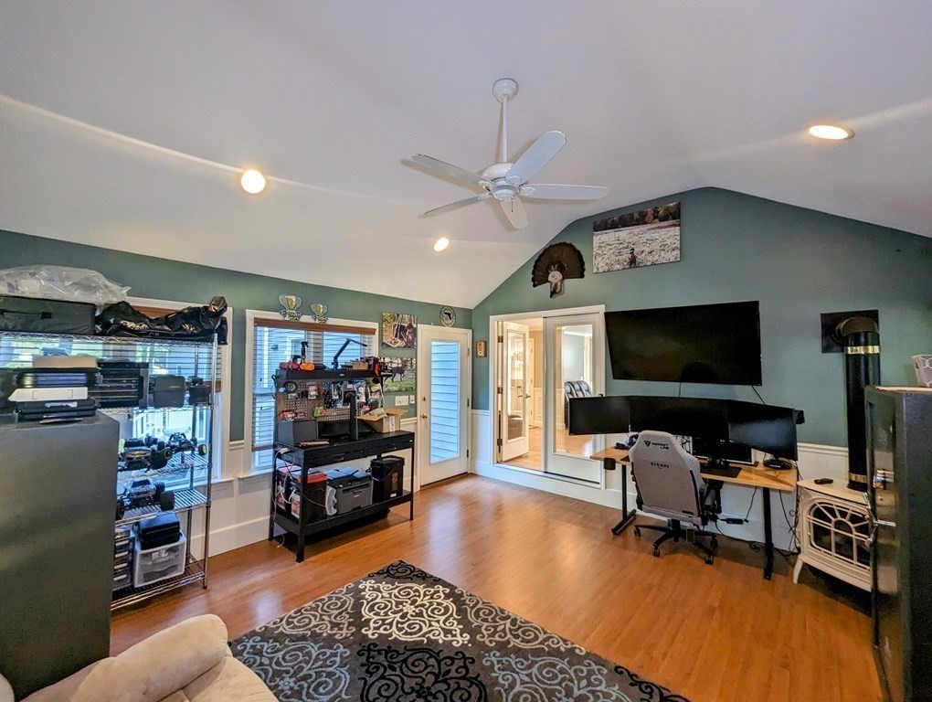 93 Blood Road Charlton, MA 01507 - Photo 28 of 42 a living room with furniture and a flat screen tv