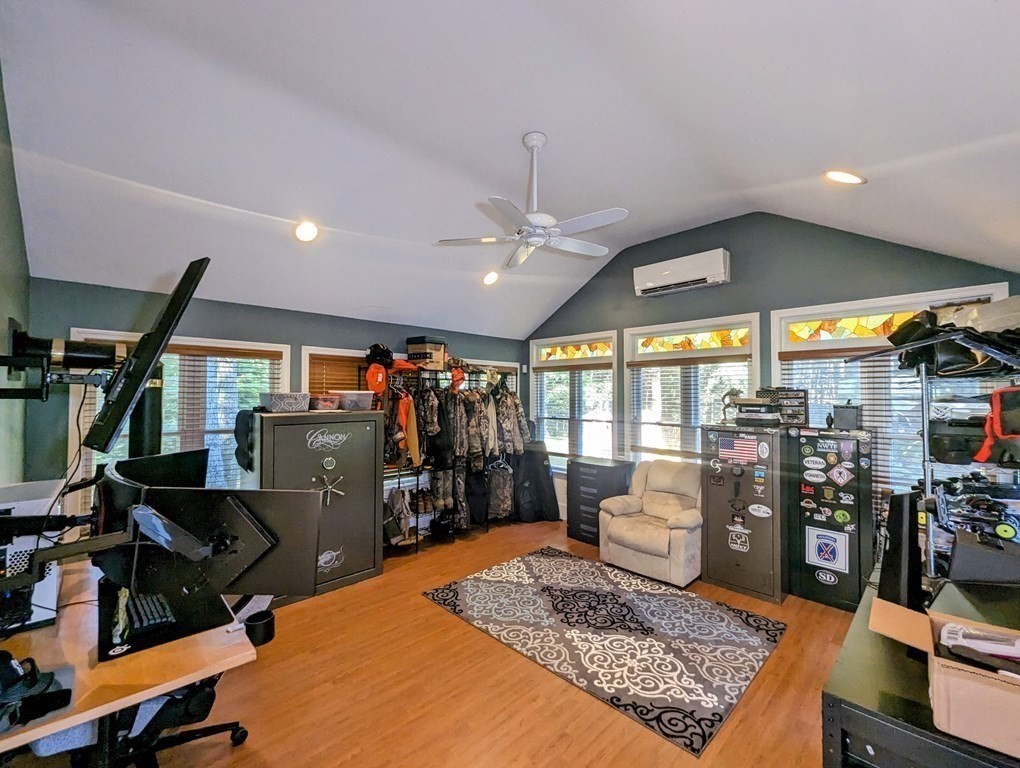 93 Blood Road Charlton, MA 01507 - Photo 29 of 42 a living room with lots of furniture and clutter