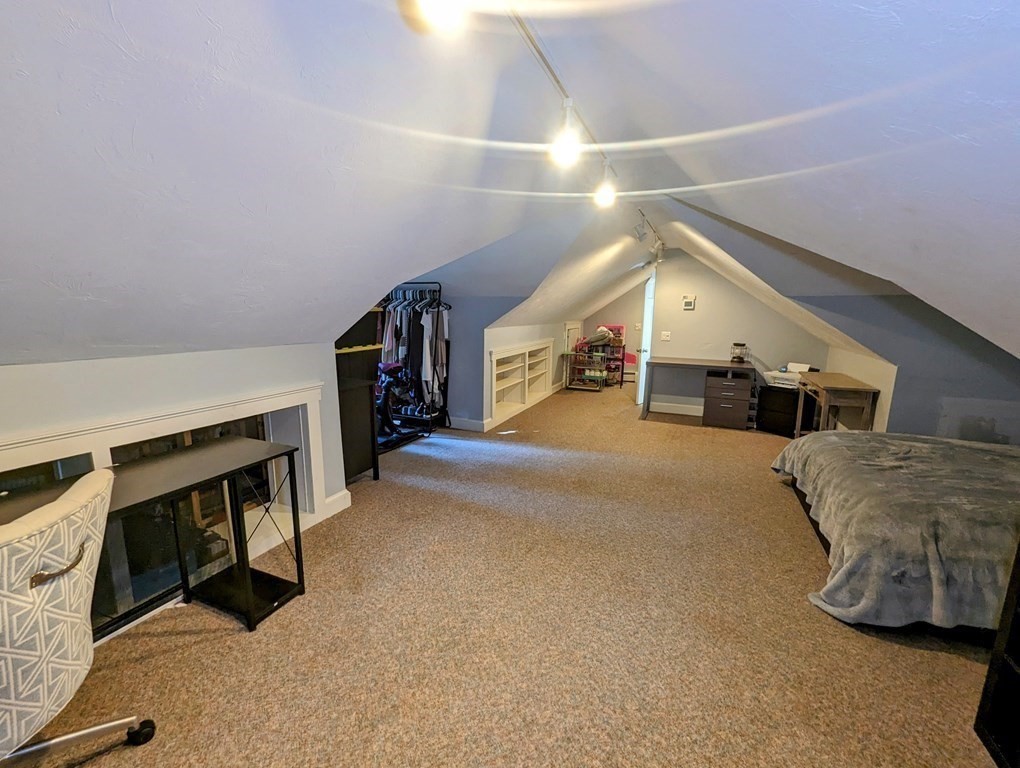 93 Blood Road Charlton, MA 01507 - Photo 33 of 42 a living room with furniture and a flat screen tv