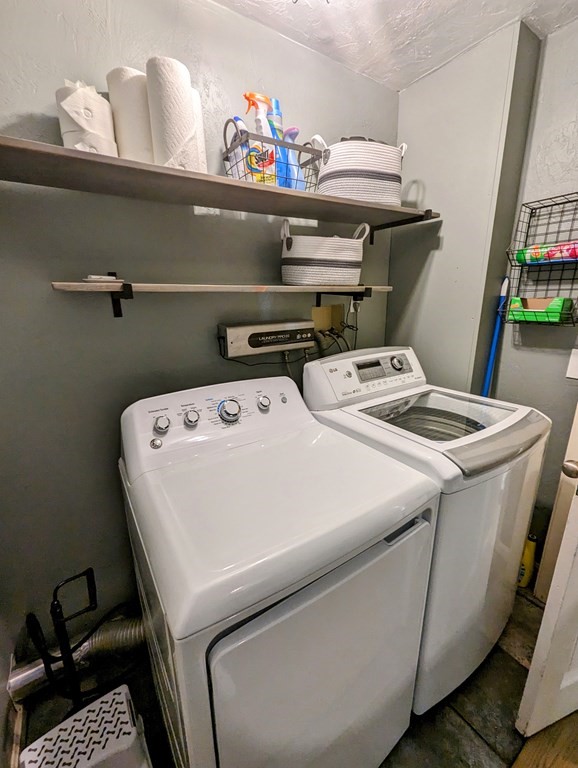 93 Blood Road Charlton, MA 01507 - Photo 42 of 42 a utility room with dryer and washer