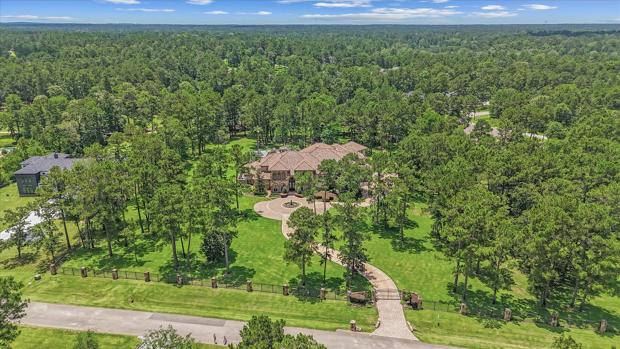 28322 Meadow Forest Magnolia, TX 77355 - Photo 50 of 50 Fully Gated 4.16 Acres with full Exterior Surveillance Cameras system. Custom stain concrete Driveway with stone pavers. Newly reconstructed concrete fountain.