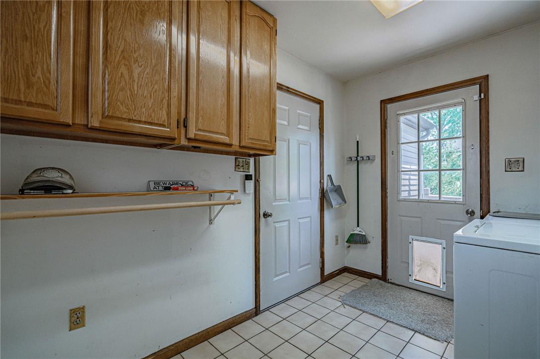 652 Old State Road Oley, PA 19547 - Photo 19 of 54 Functional utility space with ample storage and direct outdoor access.