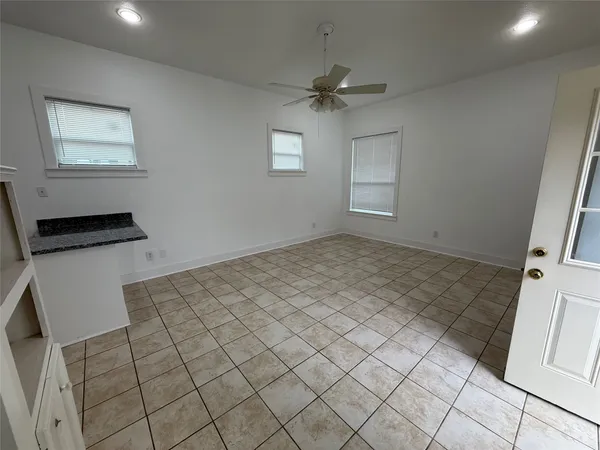 a view of an empty room and window