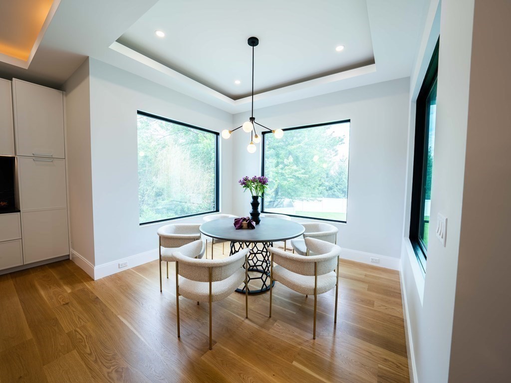 88 Levbert Road Newton, MA 02459 - Photo 13 of 41 a view of a dining room with furniture window and outside view