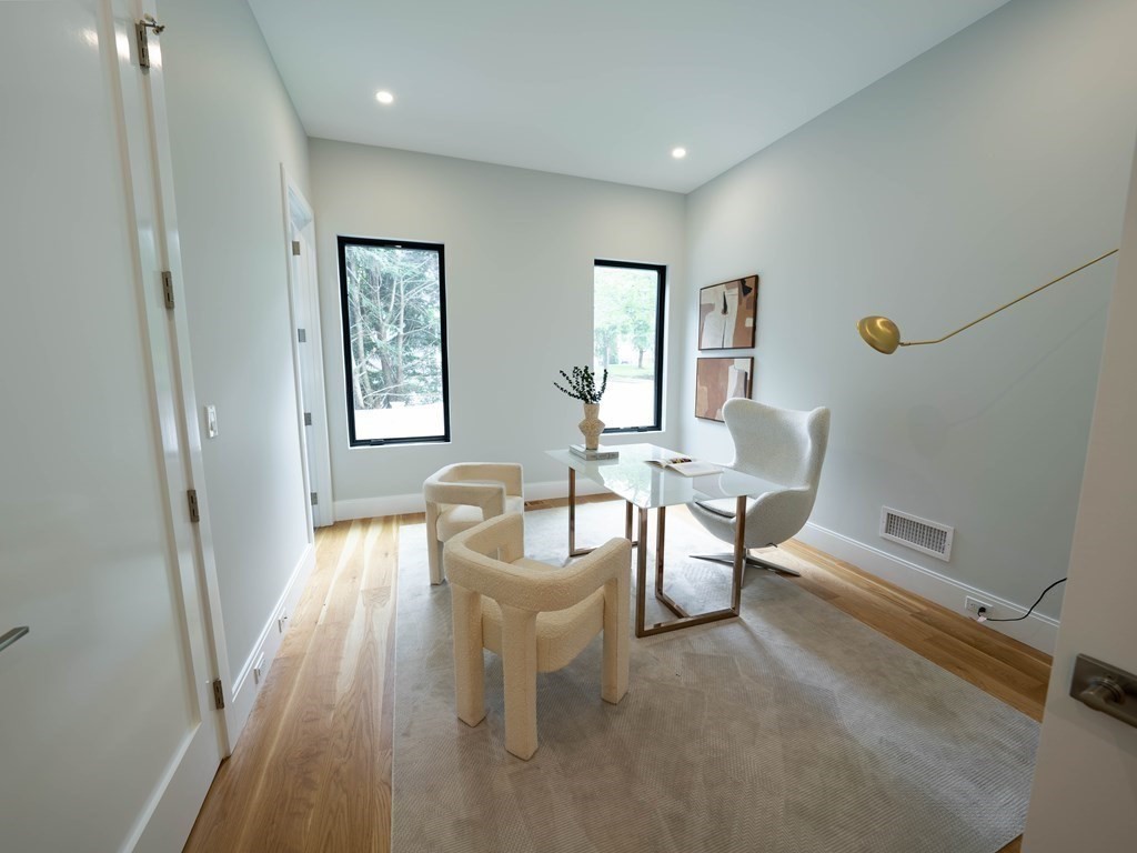 88 Levbert Road Newton, MA 02459 - Photo 15 of 41 a living room with furniture and a window
