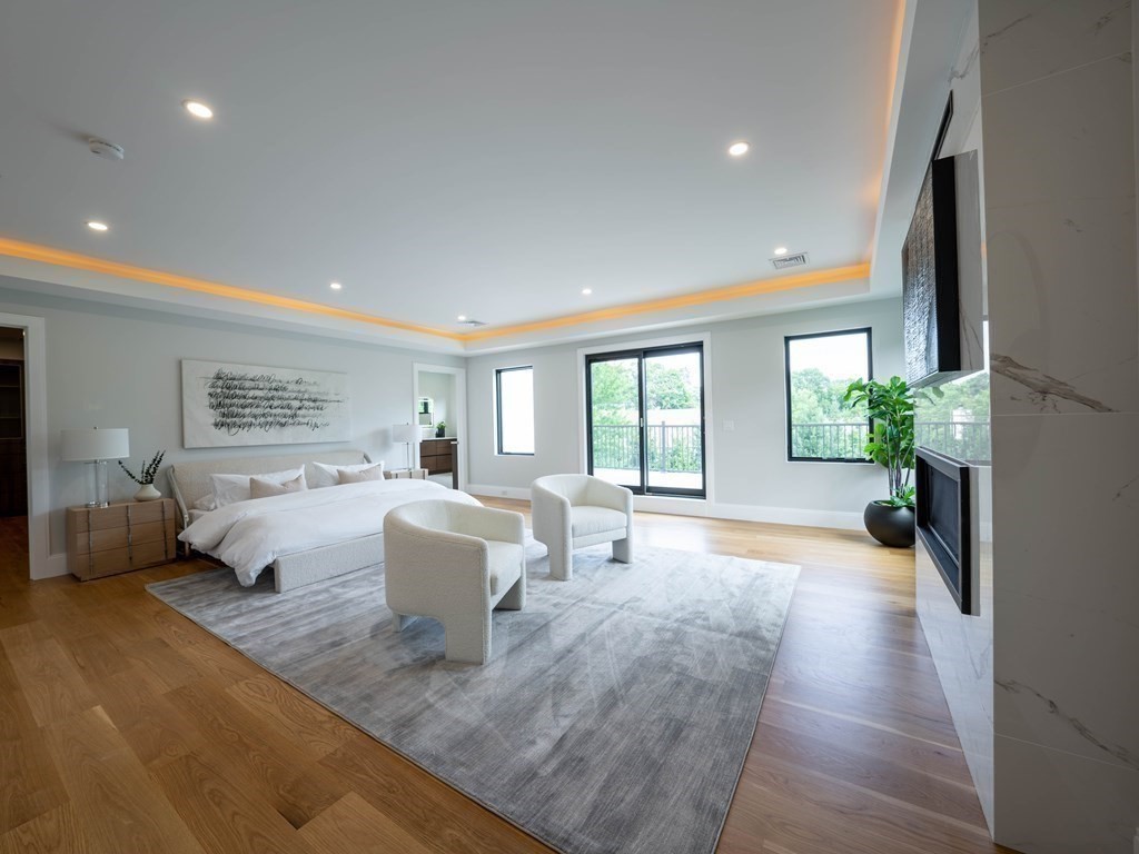 88 Levbert Road Newton, MA 02459 - Photo 18 of 41 a living room with furniture and a large window