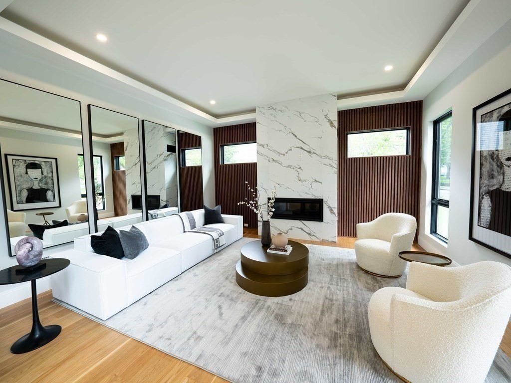 88 Levbert Road Newton, MA 02459 - Photo 2 of 41 a living room with furniture a rug and a large window