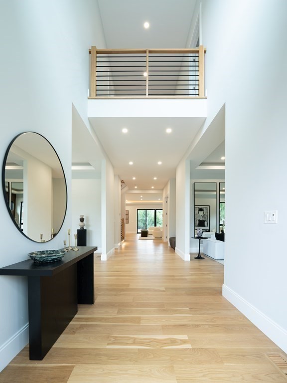 88 Levbert Road Newton, MA 02459 - Photo 3 of 41 a kitchen with stainless steel appliances granite countertop a stove and a wooden floor