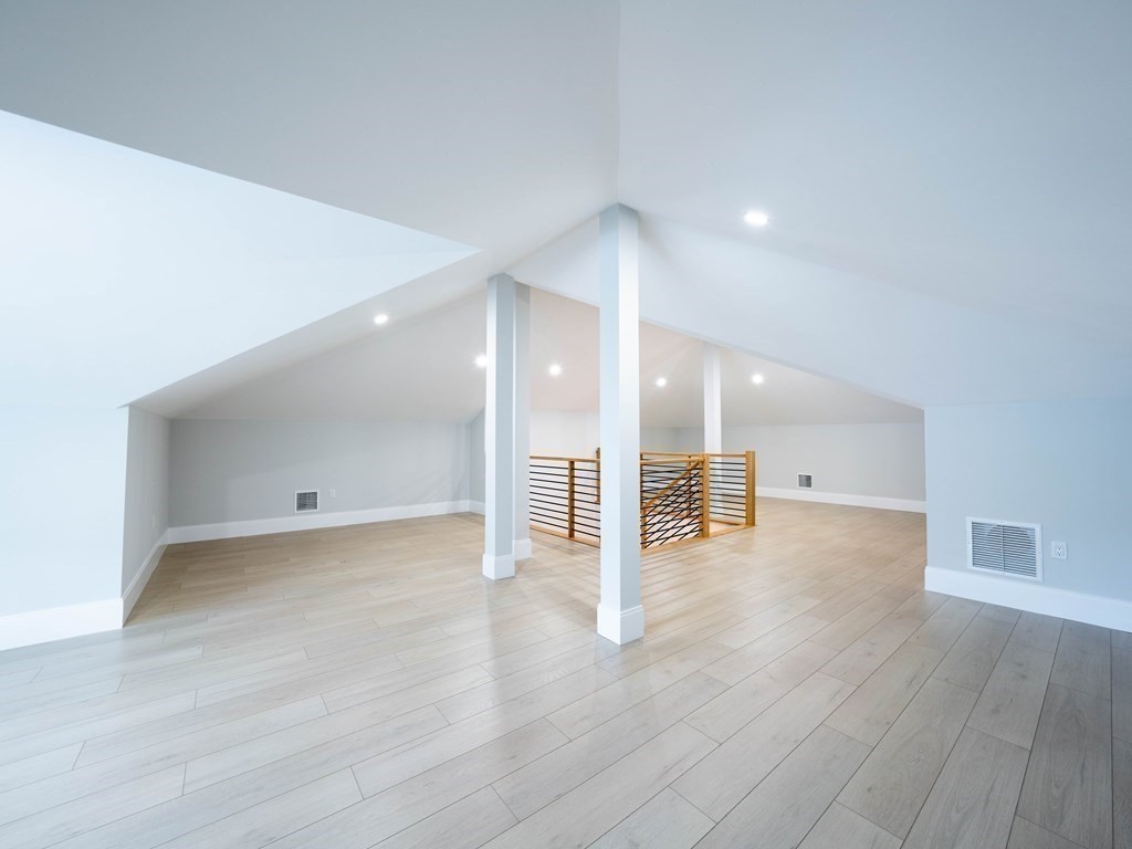 88 Levbert Road Newton, MA 02459 - Photo 31 of 41 a view of a hallway with wooden floor