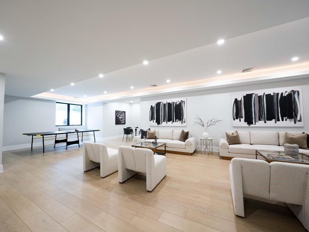 88 Levbert Road Newton, MA 02459 - Photo 34 of 41 a living room with furniture