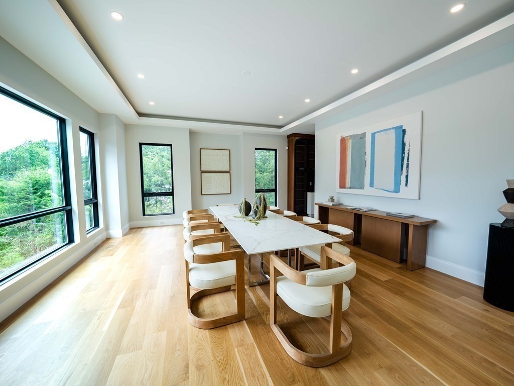 88 Levbert Road Newton, MA 02459 - Photo 4 of 41 a view of a dining room with furniture window and wooden floor