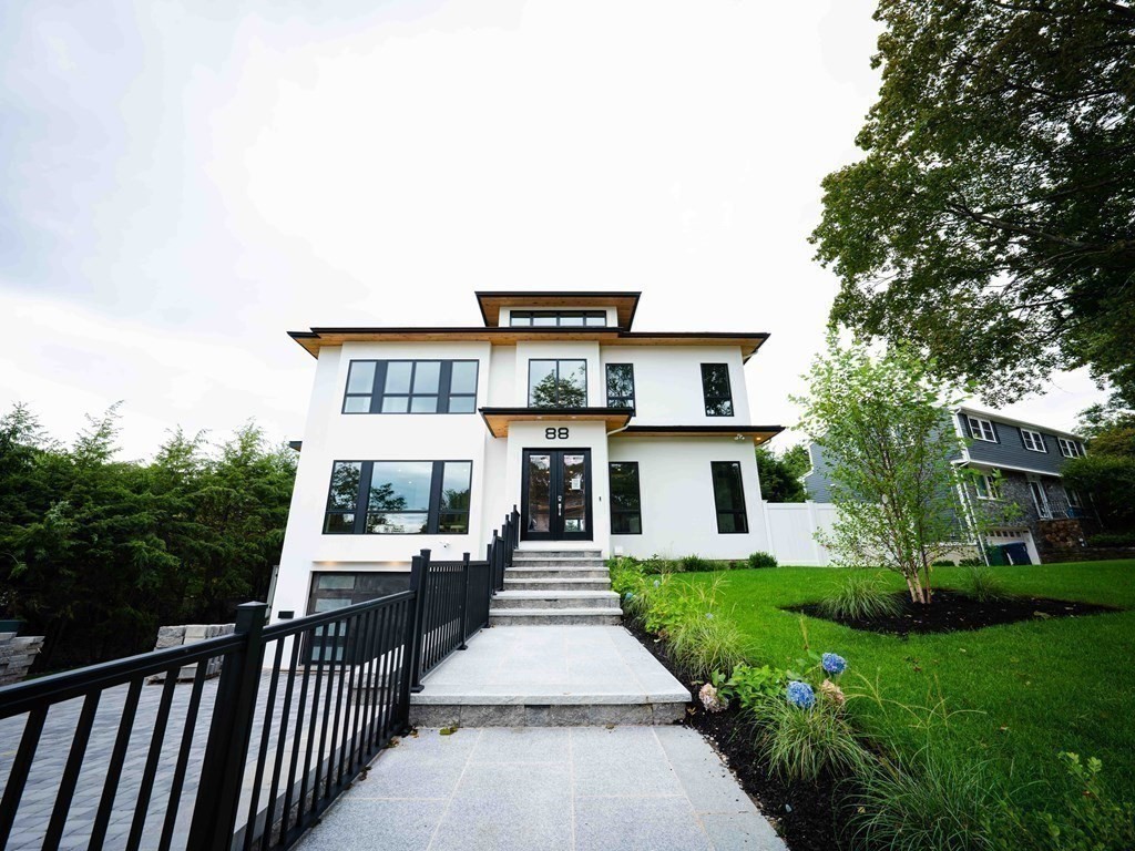 88 Levbert Road Newton, MA 02459 - Photo 41 of 41 a front view of a house with a yard