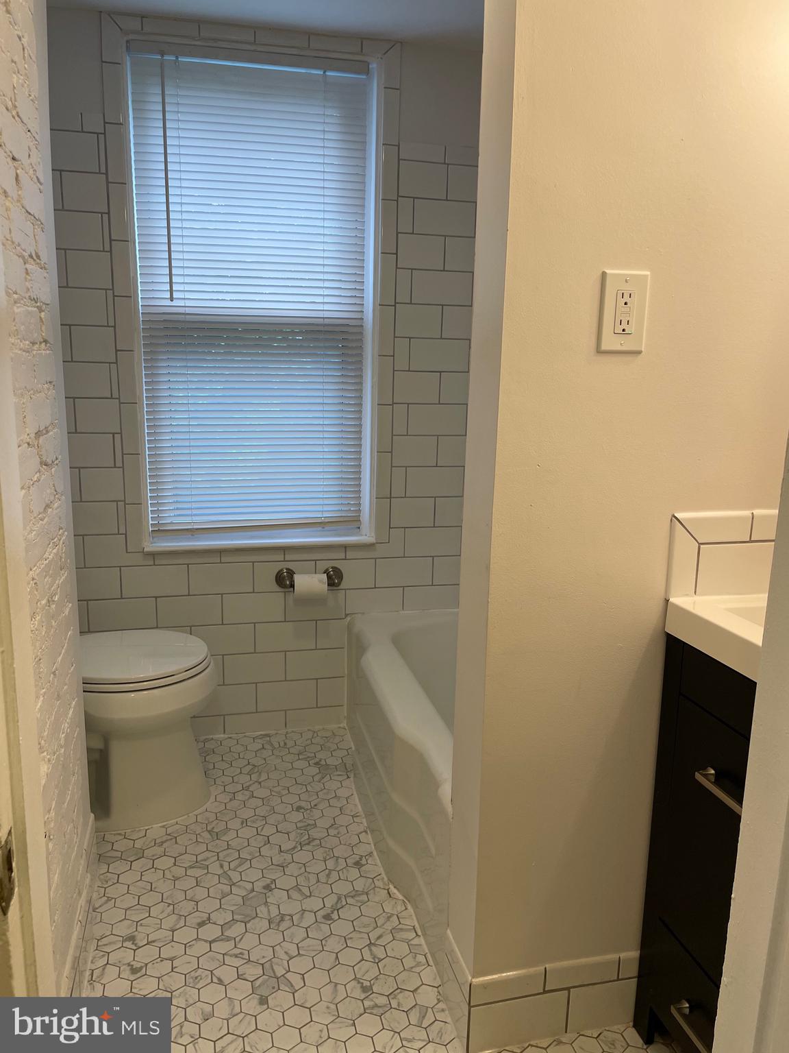 301 East Linden Street Moorestown, NJ 08057 - Photo 11 of 19 a bathroom with a toilet and a shower