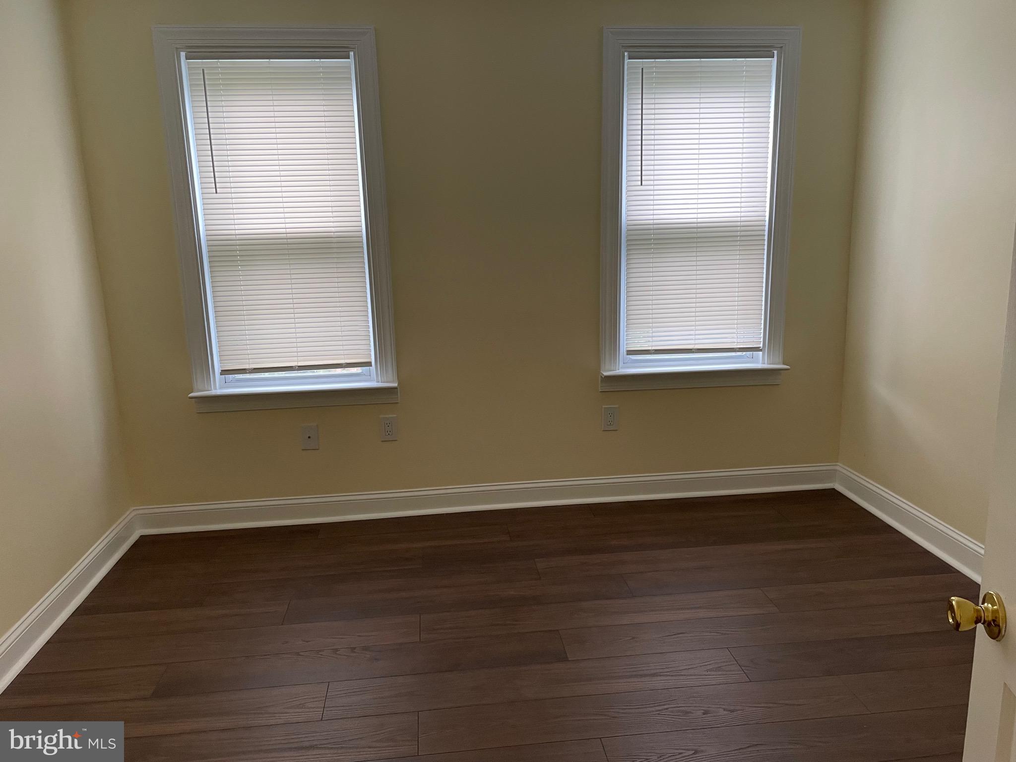 301 East Linden Street Moorestown, NJ 08057 - Photo 13 of 19 an empty room with wooden floor and windows