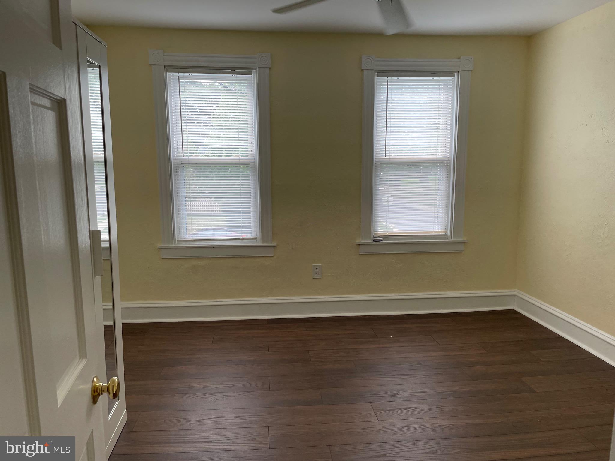 301 East Linden Street Moorestown, NJ 08057 - Photo 14 of 19 an empty room with wooden floor and windows