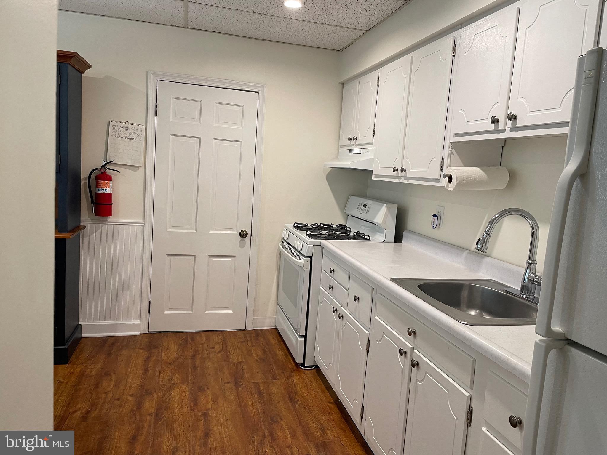 301 East Linden Street Moorestown, NJ 08057 - Photo 6 of 19 a kitchen with cabinets and appliances