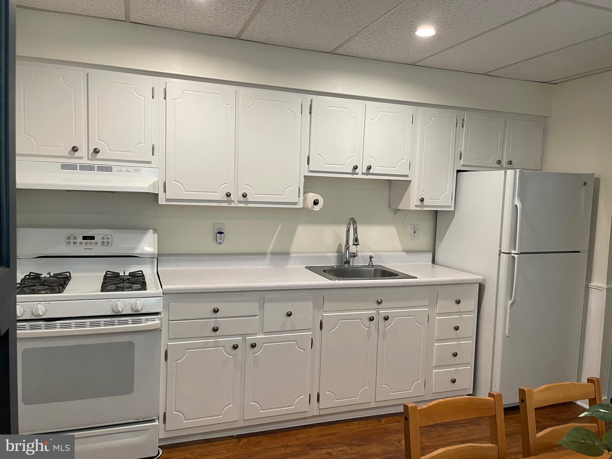 301 East Linden Street Moorestown, NJ 08057 - Photo 7 of 19 a kitchen with cabinets appliances and a sink