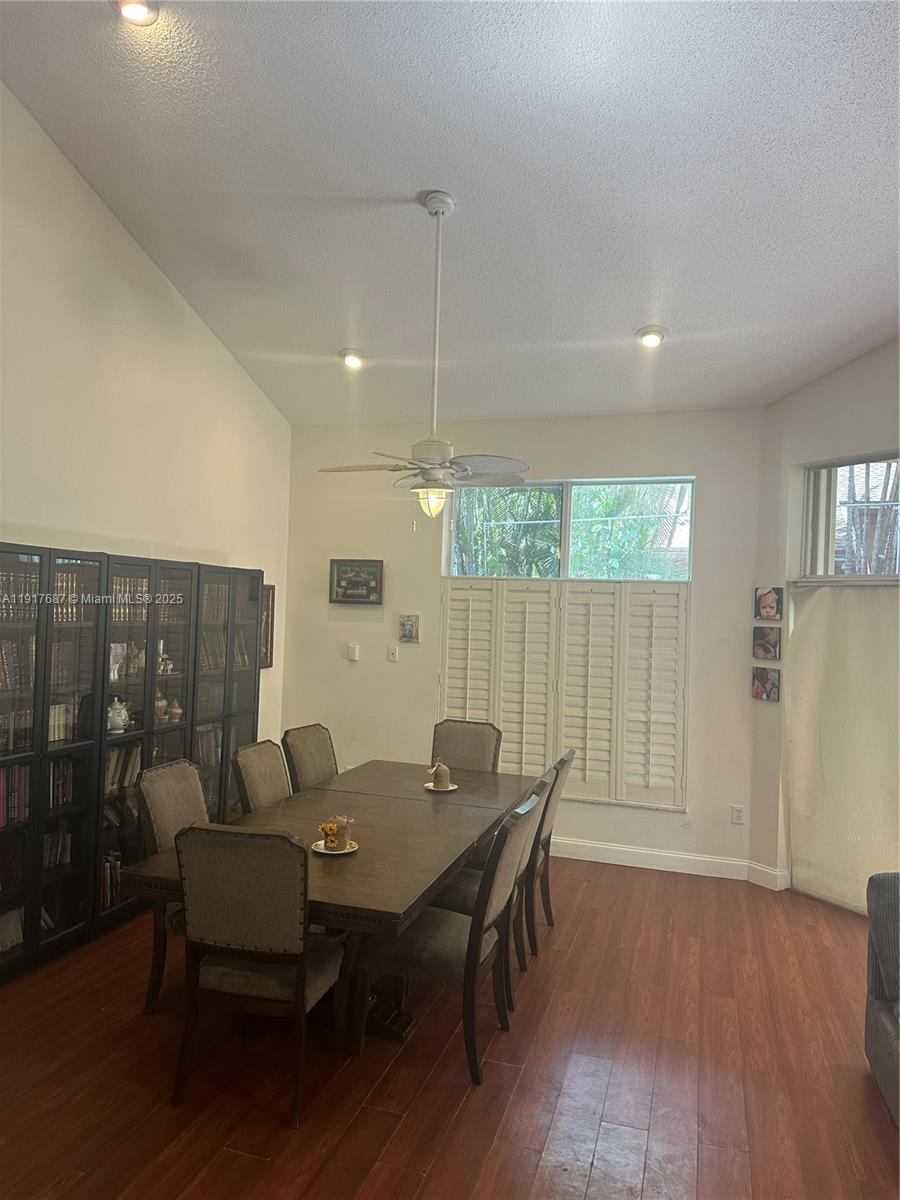 3195 North 36th Avenue Hollywood, FL 33021 - Photo 13 of 27 a dining room with furniture and wooden floor