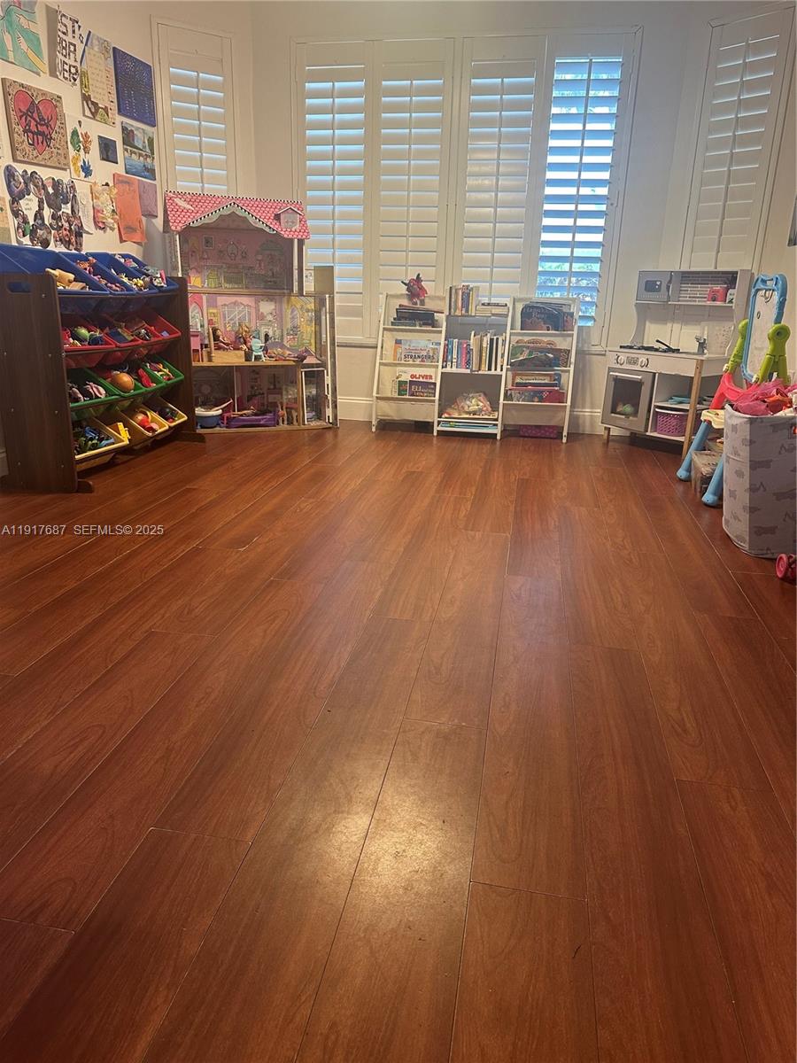 3195 North 36th Avenue Hollywood, FL 33021 - Photo 19 of 28 a living room with furniture and a large window