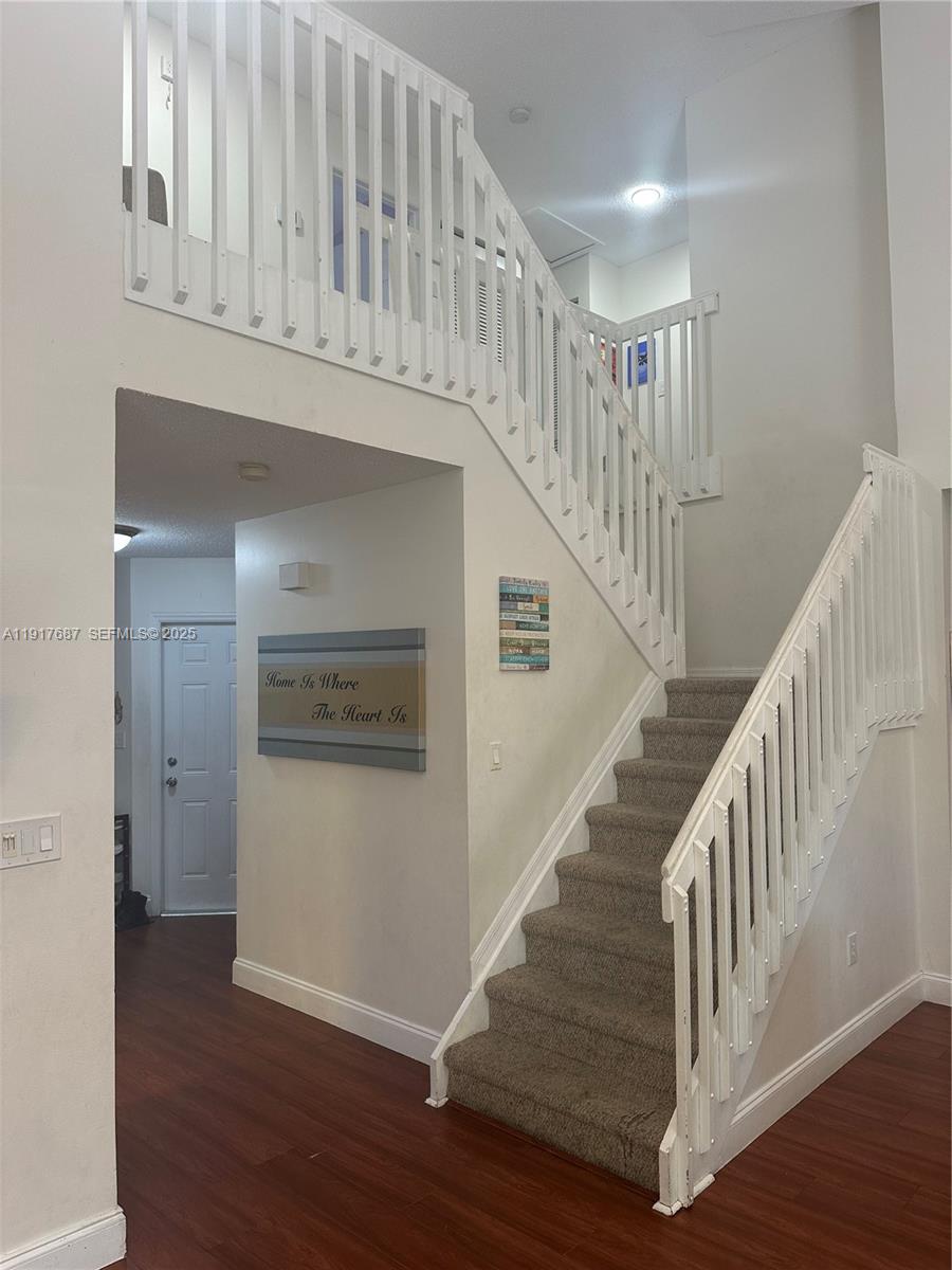 3195 North 36th Avenue Hollywood, FL 33021 - Photo 23 of 28 a view of entryway and hall with wooden floor