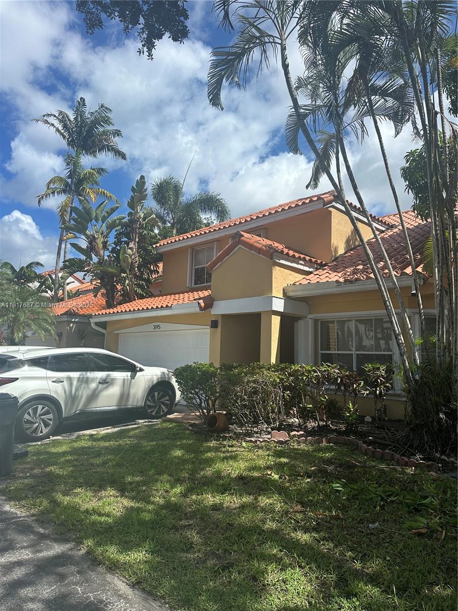 3195 North 36th Avenue Hollywood, FL 33021 - Photo 8 of 27 a view of house with a yard