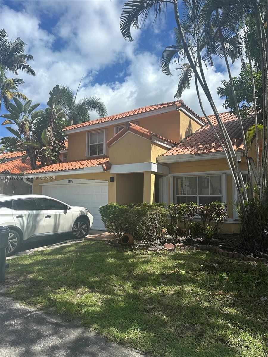 3195 North 36th Avenue Hollywood, FL 33021 - Photo 10 of 28 a front view of house with yard and outdoor seating