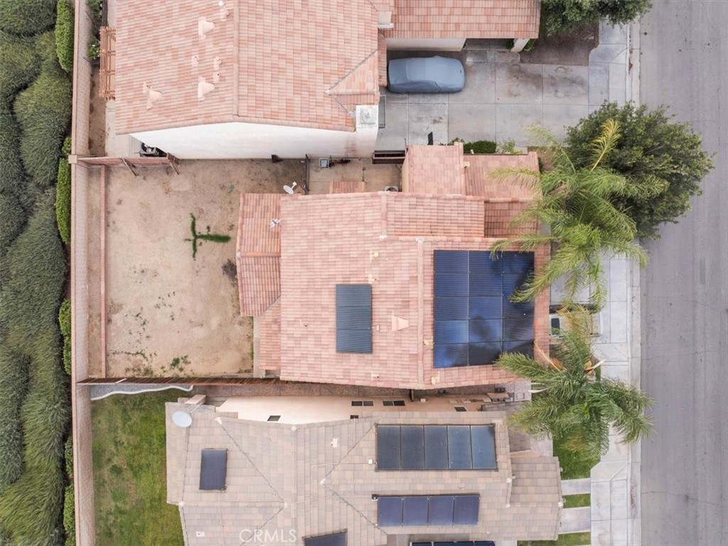1474 Albillo Loop Perris, CA 92571 - Photo 33 of 35 an aerial view of a house with a garden and plants