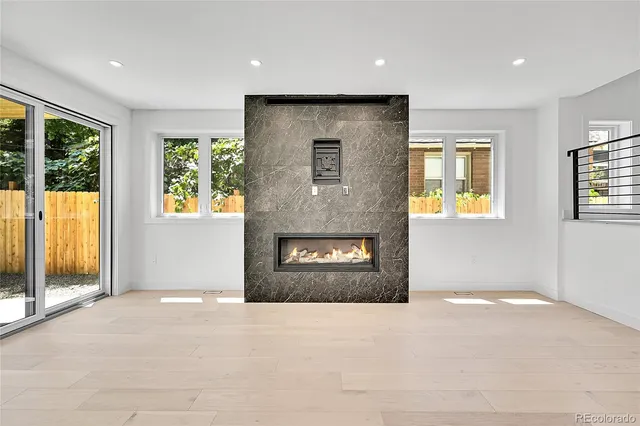 a view of an empty room with a sliding door