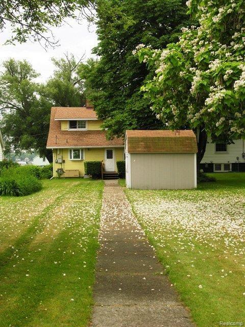 5257 Pointe Tremble Road Algonac, MI 48001 - Photo 9 of 25 12 side walk.JPG