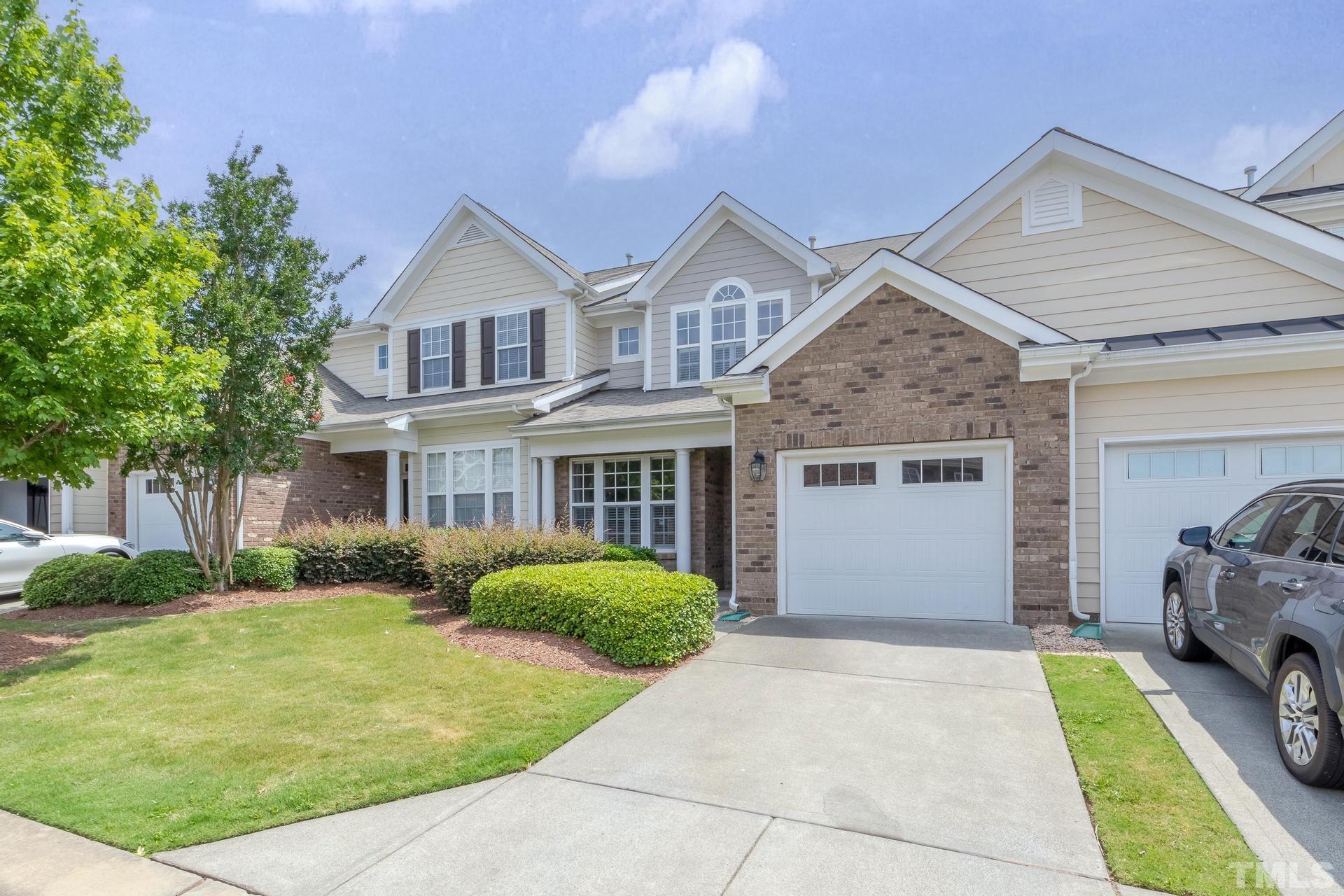 10114 Falls Meadow Court Raleigh, NC 27617 - Photo 3 of 53 a view of a yard in front of house