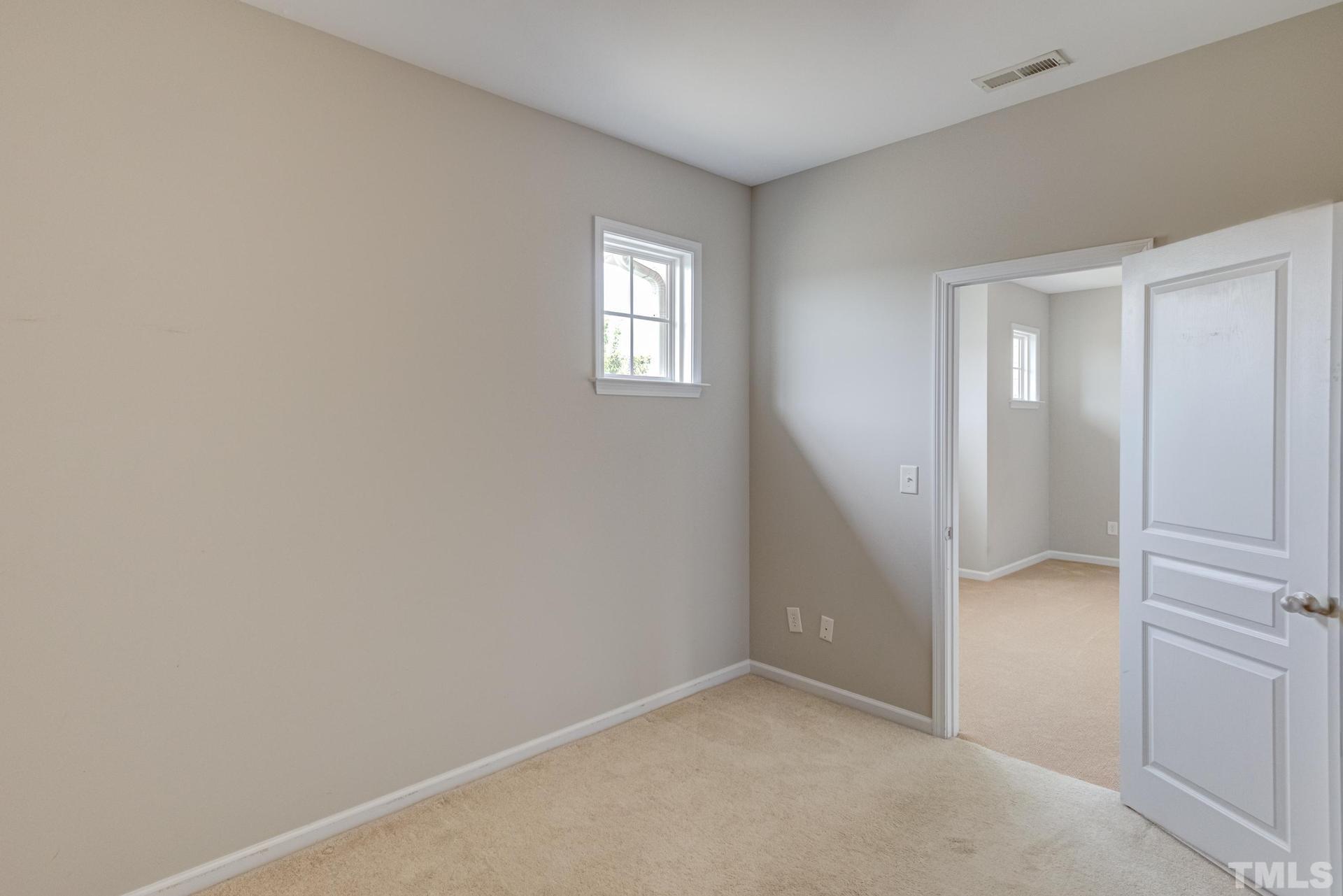 10114 Falls Meadow Court Raleigh, NC 27617 - Photo 45 of 53 an empty room with closet