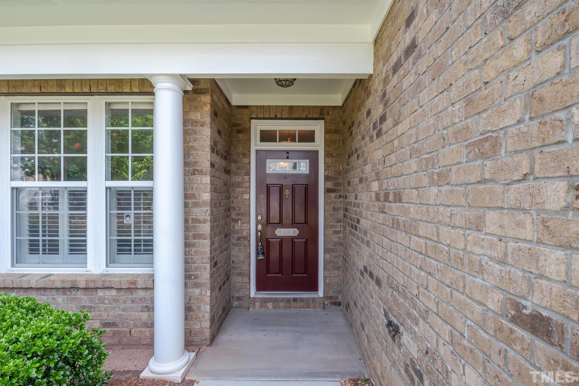 10114 Falls Meadow Court Raleigh, NC 27617 - Photo 5 of 53 a view of front door of house