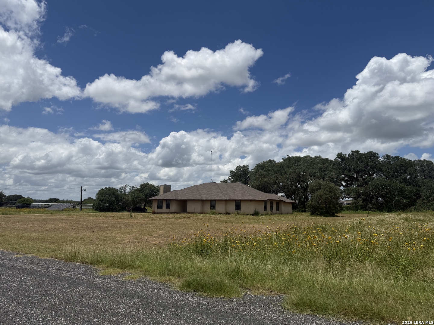 3061 Horse Ranch Road San Antonio, TX 78264 - Photo 32 of 34 a view of a house with a yard