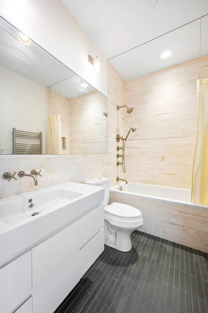 328 West 108th Street Manhattan, NY 10025 - Photo 24 of 38 a bathroom with a sink a toilet and shower