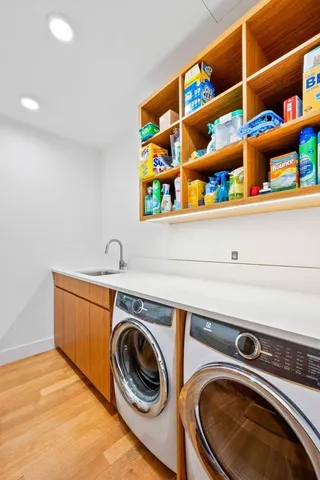 a utility room with dryer and washer