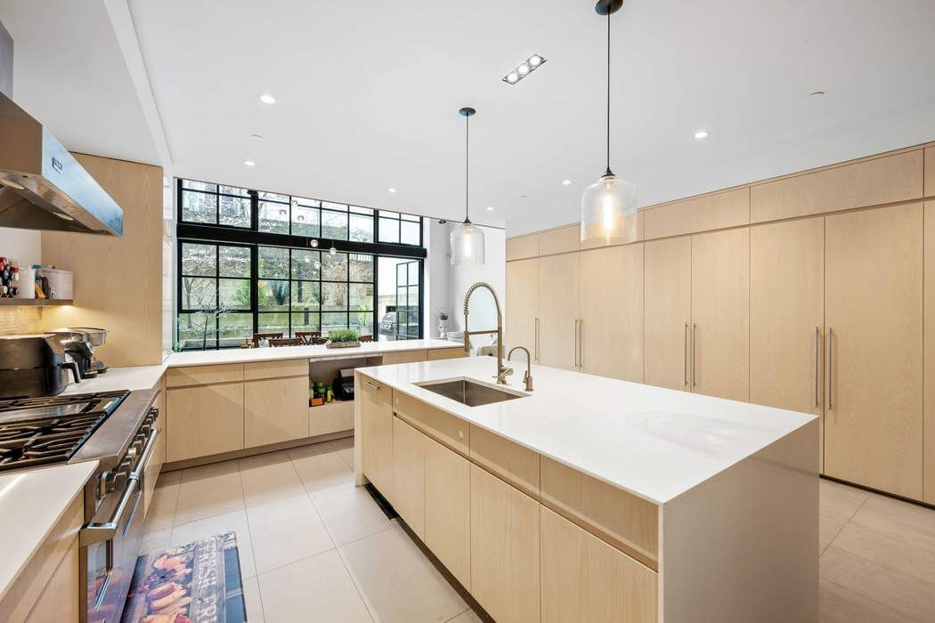 328 West 108th Street Manhattan, NY 10025 - Photo 9 of 38 a very nice looking kitchen with a large window
