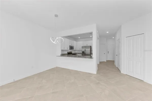 a view of kitchen and kitchen island
